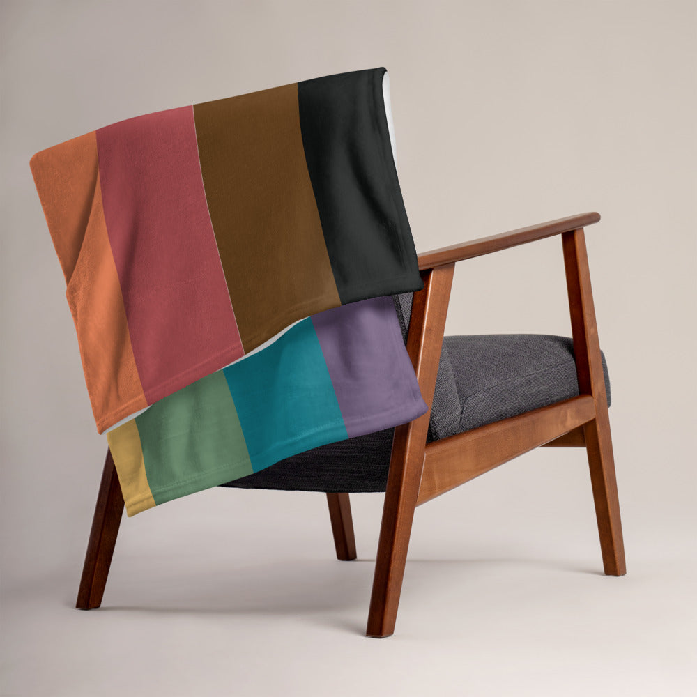 Manta con el lema Más color, más orgullo